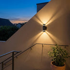 Faro outdoor wall light on an exterior house wall
